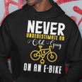 Never Underestimate An Old Guy On A Bicycle E-Bike Quote Hoodie Funny Gifts