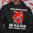 Never Underestimate An Old Man With A Hockey Stick Hoodie Unique Gifts