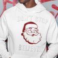 Santa Claus Don't Stop Believing Hoodie Unique Gifts