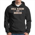 Bull Riding And Boobies CowboyHoodie