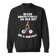 Never Underestimate An Old Guy On A Bicycle Fathers Day Sweatshirt