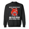 Never Underestimate An Old Man With A Hockey Stick Sweatshirt