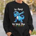 In April We Wear Blue Autism Awareness Month Dinosaur T-Rex Sweatshirt Gifts for Him