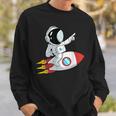 Astronaut und Rakete im Weltraum Sweatshirt, Unisex Schwarz Geschenke für Ihn