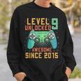 Level 9 Unlocked 9Th Birthday 9 Year Old Gamer Bday Sweatshirt Gifts for Him