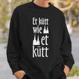 Schwarzes Sweatshirt Kölscher Spruch Et kütt wie et kütt, Dom-Silhouette Motiv Geschenke für Ihn