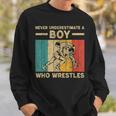 Never Underestimate A Boy Who Wrestles Vintage Wrestling Sweatshirt Gifts for Him