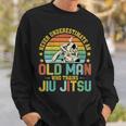 Never Underestimate An Old Man Who Trains Jiu Jitsu Mens Sweatshirt Gifts for Him