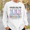 Caring For The Sweetest Bunnies Pediatric Easter Nurse Sweatshirt Gifts for Him
