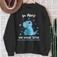 Dino In April We Wear Blue Child Abuse Prevention Awareness Sweatshirt Gifts for Old Women