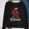 Believe Plaid Bigfoot Christmas Light Sasquatch Santa Sweatshirt Gifts for Old Women