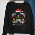 Most Likely To Eat Santas Cookies Xmas Light Sweatshirt Gifts for Old Women