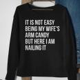 Not Easy Being My Wife's Arm Candy But Here I Am Nailing It Sweatshirt Gifts for Old Women