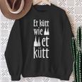 Schwarzes Sweatshirt Kölscher Spruch Et kütt wie et kütt, Dom-Silhouette Motiv Geschenke für alte Frauen