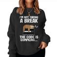 The Code Is Compiling Coder Sloth Coding Programmateur Amusant Women Sweatshirt