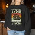 Never Underestimate A Woman With A Tractor Farmer Women Sweatshirt Funny Gifts
