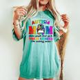 Autism Mom Raising Hero Groovy Messy Bun Autism Awareness Women's Oversized Comfort T-shirt Chalky Mint