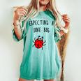 Expecting A June Bug Pregnant Future Mother T Women's Oversized Comfort T-shirt Chalky Mint