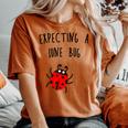 Expecting A June Bug Pregnant Future Mother T Women's Oversized Comfort T-shirt Yam