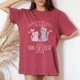 I Have A Secret I´M Going To Be A Big Sister 2024 Women's Oversized Comfort T-Shirt Crimson