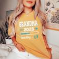 Grandma 2023 Loading Grandmother Grandma-To-Be Grandparents Women's Oversized Comfort T-Shirt Mustard