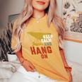 Keep Calm And Hang On Hang Gliding And Kite Surfing Women's Oversized Comfort T-Shirt Mustard