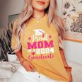 Proud Mom Of 2024 Graduate Senior Mother College Graduation Women's Oversized Comfort T-Shirt Mustard