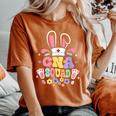 Retro Groovy Cna Squad Bunny Ear Flower Easter Women's Oversized Comfort T-Shirt Yam