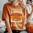 Never Underestimate A Woman With A Tractor Farmer Women's Oversized Comfort T-Shirt Yam