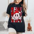 Merry Christmas Smile Face Santa Claus Hat Groovy Retro Women's Oversized Comfort T-Shirt Black