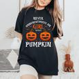 Never Underestimate A Girl With A Pumpkin Present Women's Oversized Comfort T-Shirt Black