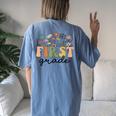 First Grade Teacher Wildflower Back To School Floral Outfits Women's Oversized Comfort T-Shirt Back Print Moss