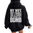 My Wife Isn't Fragile Like A Flower She Is Like A Bomb Women Oversized Hoodie Back Print Black