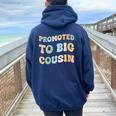 Promoted To Big Cousin Groovy Pastel Vintage Women Oversized Hoodie Back Print Navy Blue