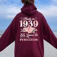 85 Year Old Made In 1939 Floral 85Th Birthday Women Women Oversized Hoodie Back Print Maroon