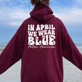 In April We Wear Blue Groovy Autism Awareness Women Oversized Hoodie Back Print Maroon