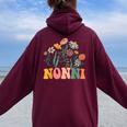 New Nonni Wildflower First Birthday & Baby Shower Women Oversized Hoodie Back Print Maroon