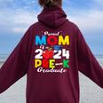 Proud Mom Of Pre-K Graduate 2024 Graduation Mom Women Oversized Hoodie Back Print Maroon