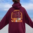 Retro Groovy Social Worker Flower Social Work Month Women Oversized Hoodie Back Print Maroon