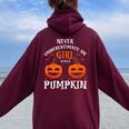 Never Underestimate A Girl With A Pumpkin Present Women Oversized Hoodie Back Print Maroon