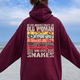 Vintage Never Underestimate An Old Woman Who Loves Snakes Women Oversized Hoodie Back Print Maroon