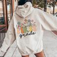 First Grade Teacher Wildflower Back To School Floral Outfits Women Oversized Hoodie Back Print Sand