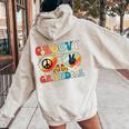 Groovy Grandma 70S Vibe Bday Colors Groovy Peace Sign Women Oversized Hoodie Back Print Sand