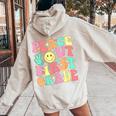 Peace Out First Grade Groovy 1St Grade Last Day Of School Women Oversized Hoodie Back Print Sand