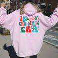 In My Christmas Era Cute Groovy Christmas Holiday Xmas Women Oversized Hoodie Back Print Light Pink