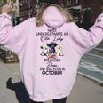 Never Underestimate An Old Lady Who Loves Dogs October Women Oversized Hoodie Back Print Light Pink