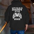 Leveling Up To Daddy Again 2022 Dad Pregnancy Announcement Zip Up Hoodie Back Print