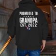 Promoted To Grandpa Est 2022 Pregnancy Reveal Pink Or Blue Zip Up Hoodie Back Print