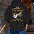 Never Underestimate Grandpa Who Is Also A Ukulele Player Zip Up Hoodie Back Print
