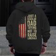Just A Regular Dad Trying Not To Raise Liberals Father's Day Zip Up Hoodie Back Print